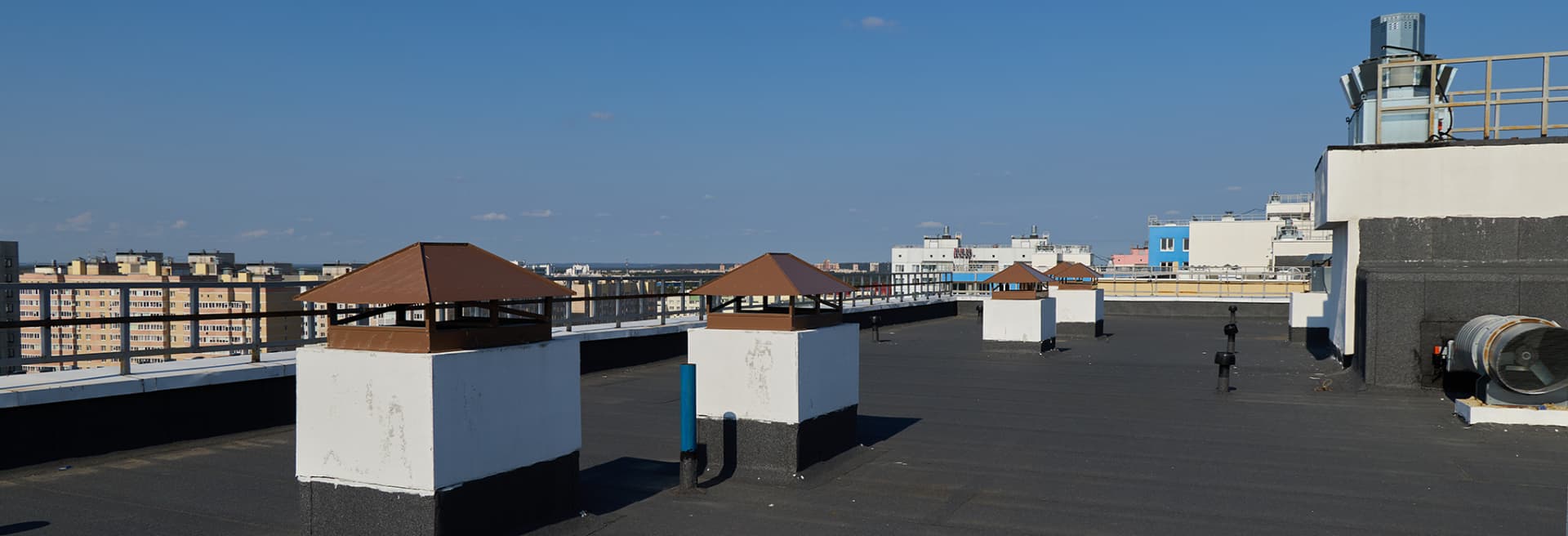 Black EPDM rubber roof on a commercial building