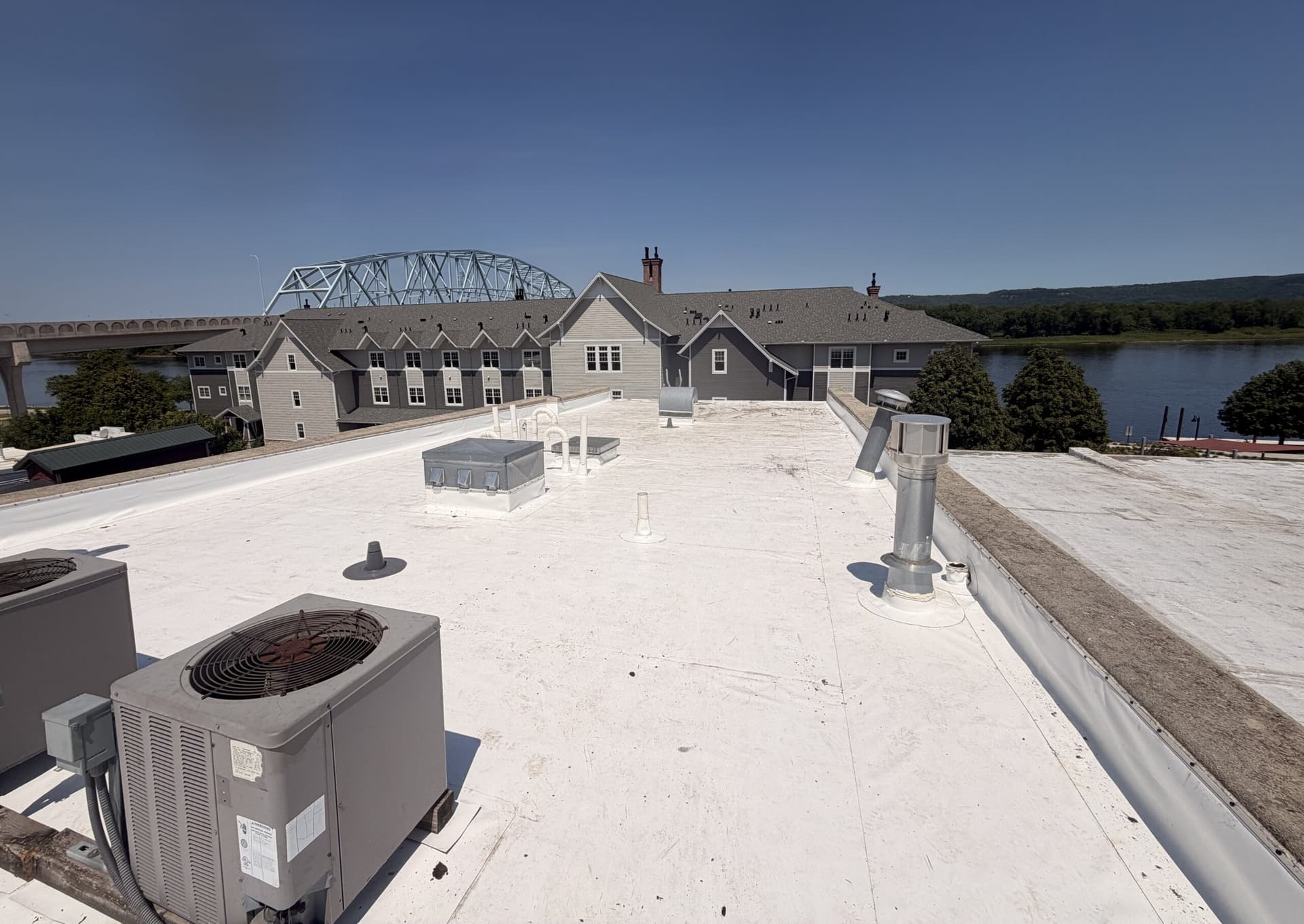 White TPO membrane roof with rooftop units